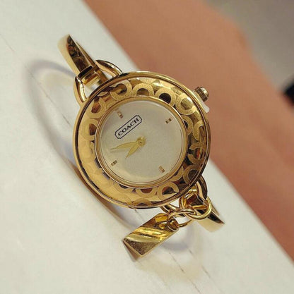 Phoebe Quartz White Dial, Gold Stainless Steel Ladies Casual Bangle Watch